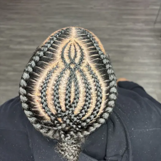 Man bun braids (freestyle) braided by Tiffany Joy
