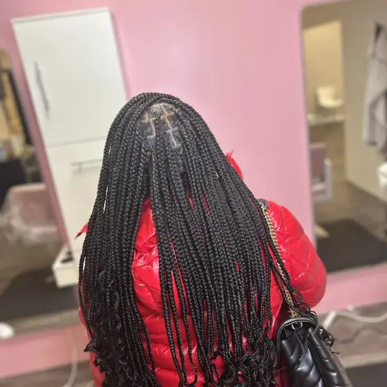 Medium knotless mid back braided by Tiffany Joy