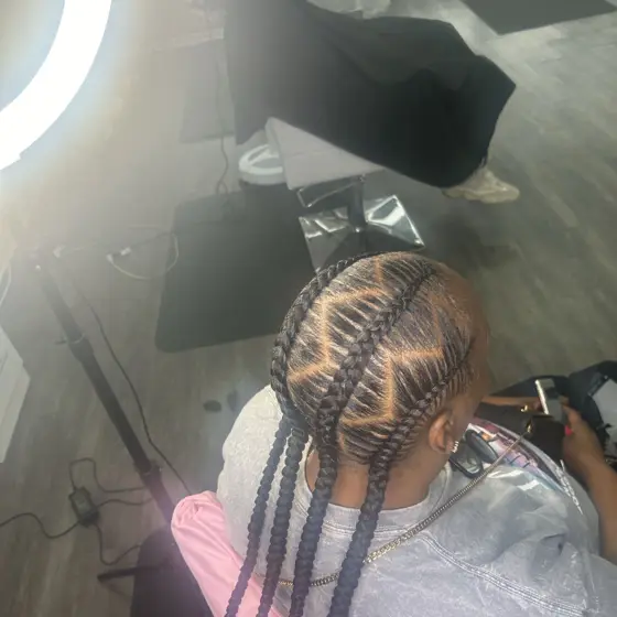 4 stitch braids freestyle braided by Tiffany Joy