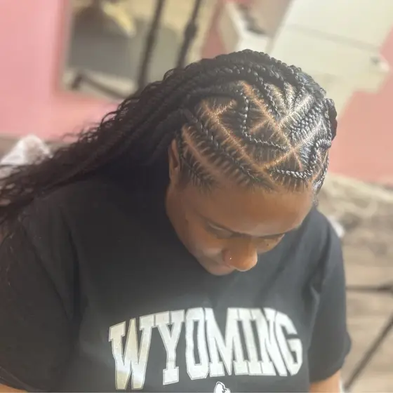 Over 9 stitch braids with sew in braided by Tiffany Joy