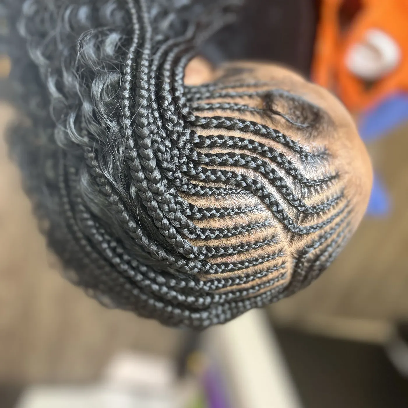 Over 9 stitch braids with sew in braided by Tiffany Joy